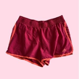 adidas magenta women’s running shorts - size m